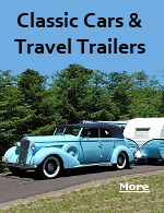 A 1935 Pontiac with matching Turquoise ''Canned Ham'' travel trailer.